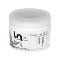 Unwash Charcoal Detox Scalp Scrub bottle close-up showing detoxifying charcoal for a refreshed scalp.