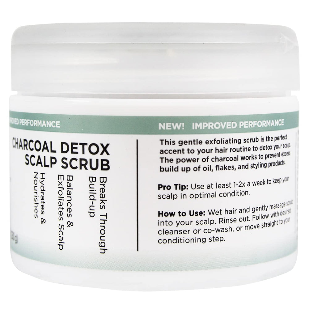 Unwash Charcoal Detox Scalp Scrub bottle beside conditioner for enhanced absorption ritual.
