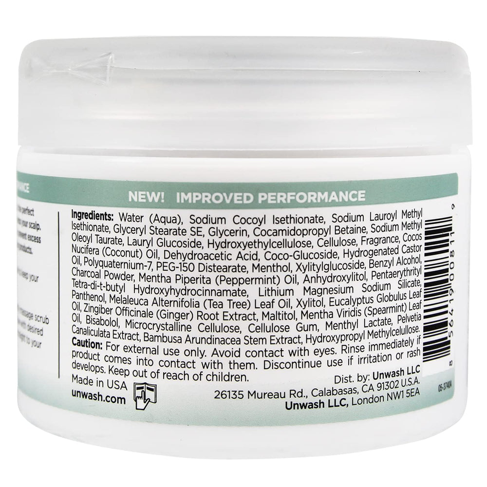 Unwash Charcoal Detox Scalp Scrub on scalp to relieve flakes and cleanse.