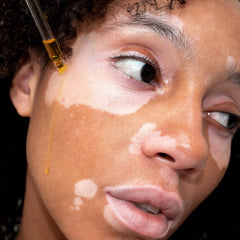 Swirl of rosehip and sea buckthorn oils in smooth serum for balanced hydration.