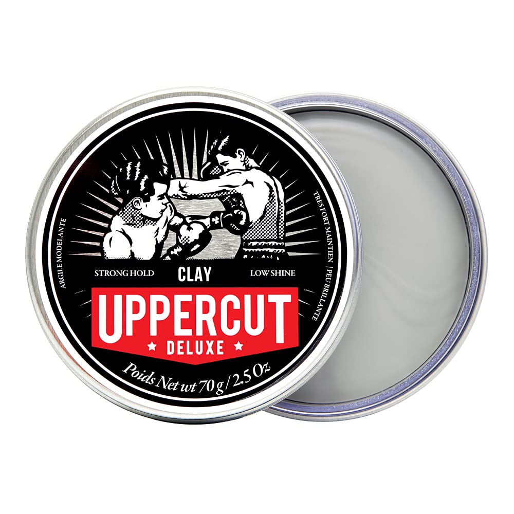 Uppercut Deluxe Clay hands applying product demonstrates reworkable hold while styling.