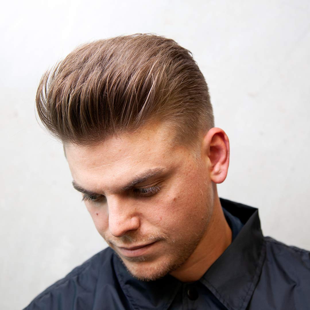 Uppercut Deluxe Clay label close-up highlights matte finish and water-wax formula.