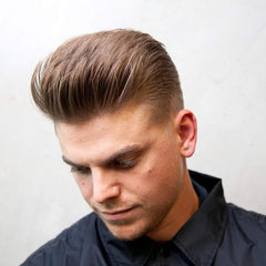 Uppercut Deluxe Clay label close-up highlights matte finish and water-wax formula.
