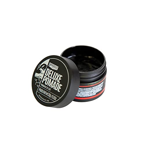 Uppercut Deluxe Pomade in barber kit for classic looks