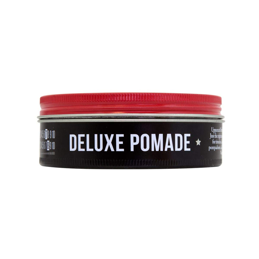 Uppercut Deluxe hair pomade on styled hair showing high shine