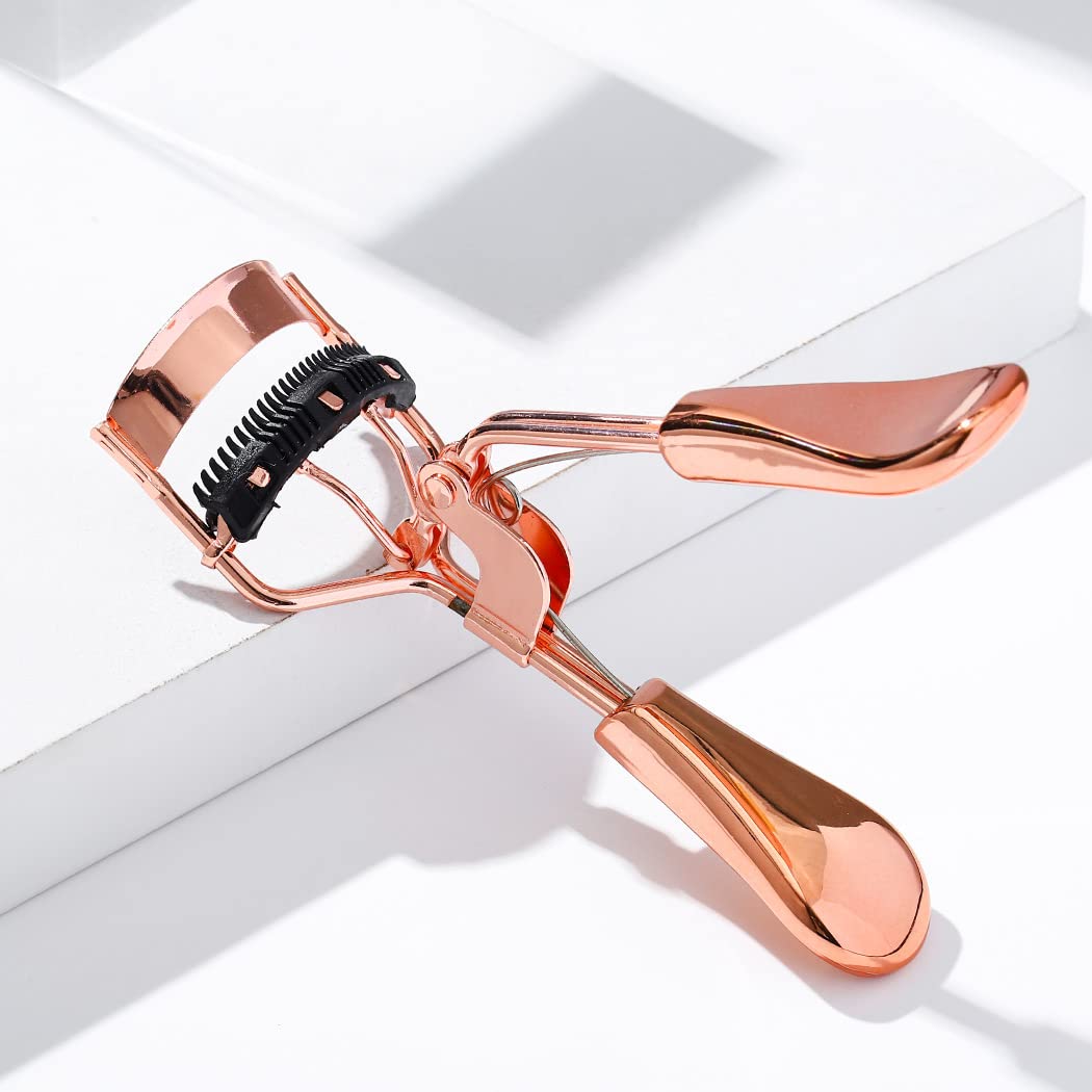 Uranian Beauty Eyelash Curler Comb pads installed demonstrating easy replacement and hygiene.