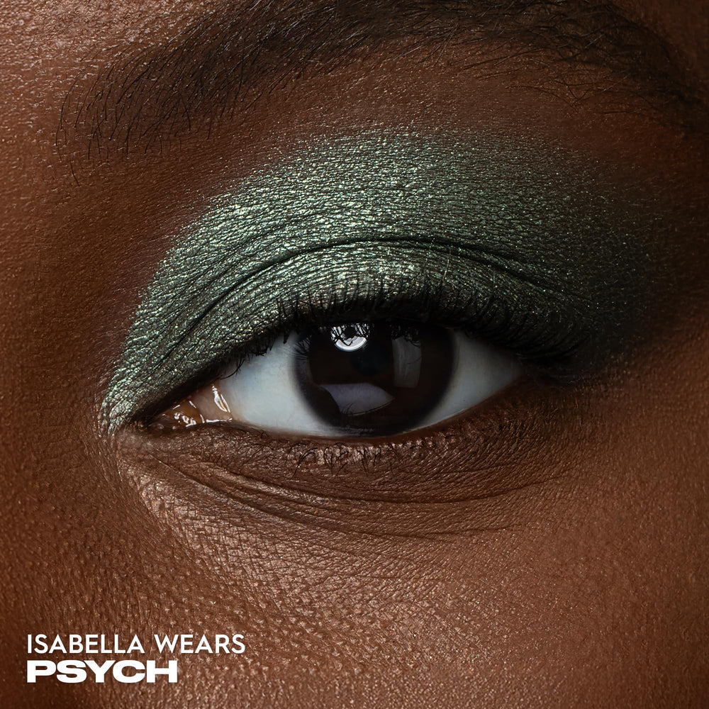 Urban Decay 24/7 Eyeshadow Psych warm-green metallic swatch shows lasting shimmer for all-day shine.