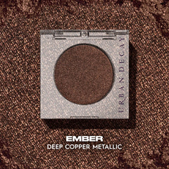 Urban Decay 24/7 Eyeshadow Ember metallic finish demonstrates long-wearing shimmer.