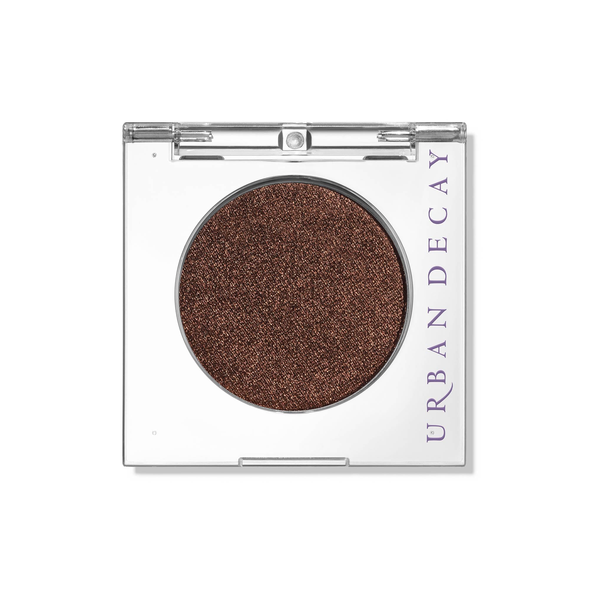 Urban Decay 24/7 Eyeshadow Ember swatch highlights rich copper pigment for a bold look.