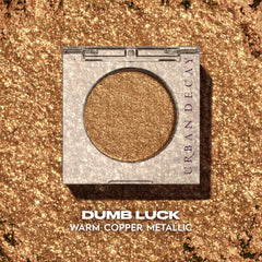 Urban Decay Dumb Luck single compact shows sleek crease-free color.