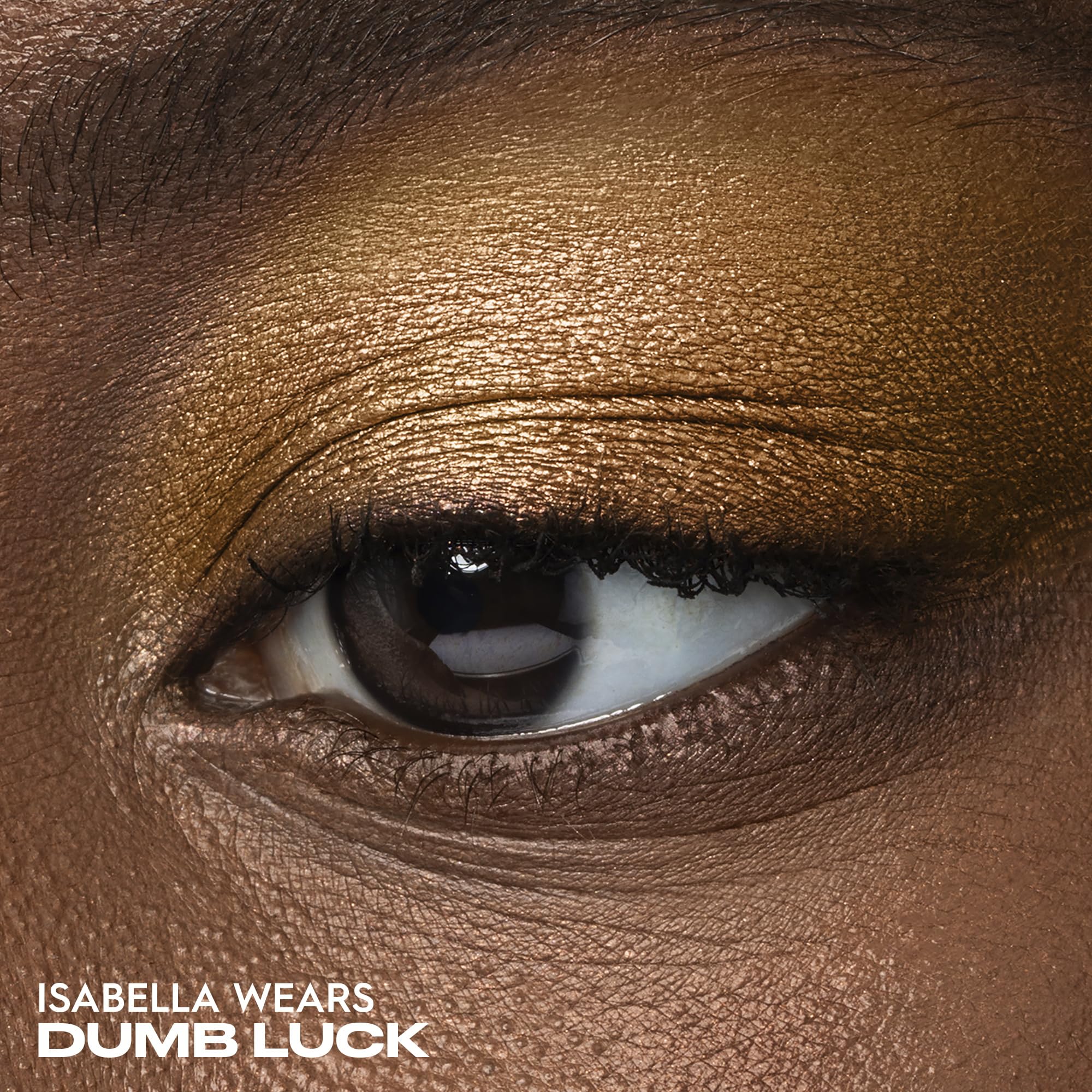 Urban Decay Dumb Luck copper metallic swatch delivers radiant shimmer.