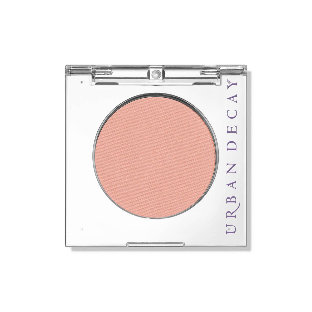 Urban Decay 24/7 Introvert peach matte compact close-up showing crease-free wear.