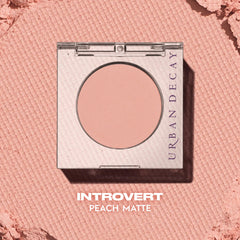 Urban Decay 24/7 Introvert peach matte open compact reveals creamy texture.