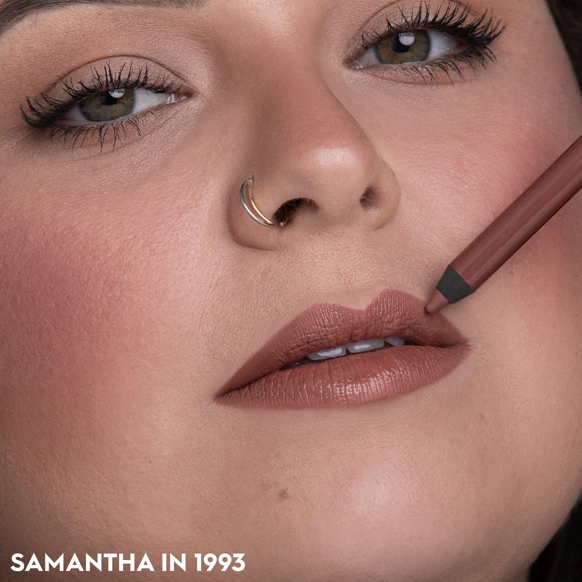 Urban Decay 24/7 Lip Pencil closeup highlights moisturizing ingredients like vitamin E.