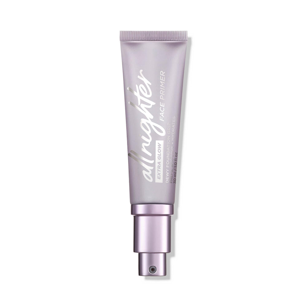 Urban Decay All Nighter Extra Glow bottle closeup highlighting vegan, hydrating primer for dewy skin.
