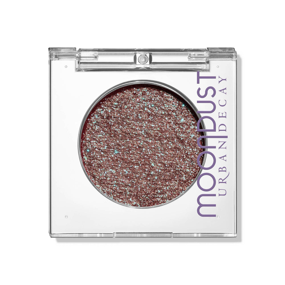 Urban Decay Moondust Solstice eye shadow sparkle for bold, long-lasting shine.