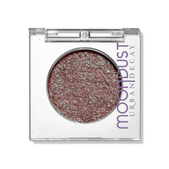 Urban Decay Moondust Solstice eye shadow sparkle for bold, long-lasting shine.