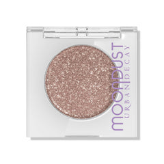 Urban Decay Moondust Space Cowboy swatch reveals champagne gold sparkle for light-catching glow
