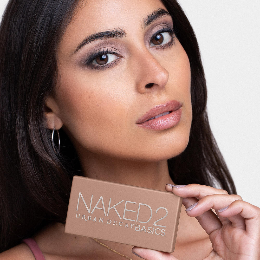 URBAN DECAY Naked 2 Basics mini palette-fold-out-mirror demonstrating travel-friendly convenience for touchups.