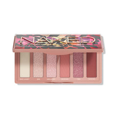 Urban Decay Naked Mini Sin palette open with olive neutrals for versatile day-to-night looks.