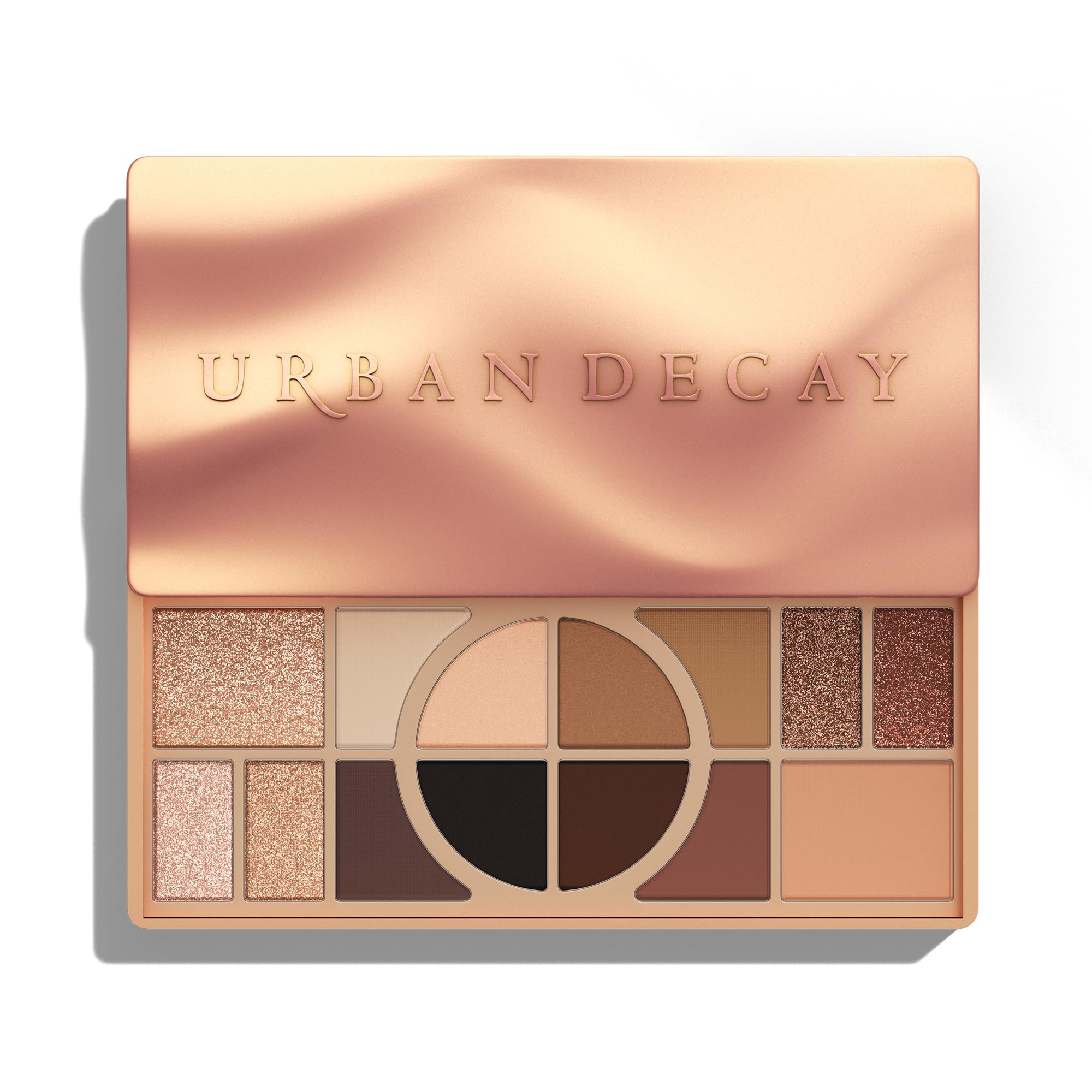 Urban Decay Naked Shaped palette open shows warm tones for versatile eye and face looks