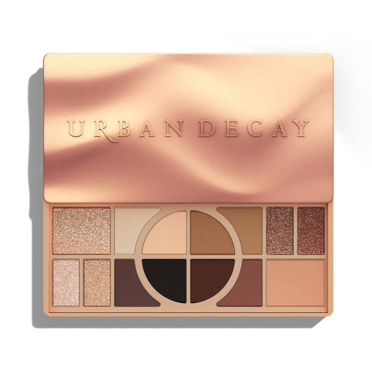 Urban Decay Naked Shaped palette open shows warm tones for versatile eye and face looks