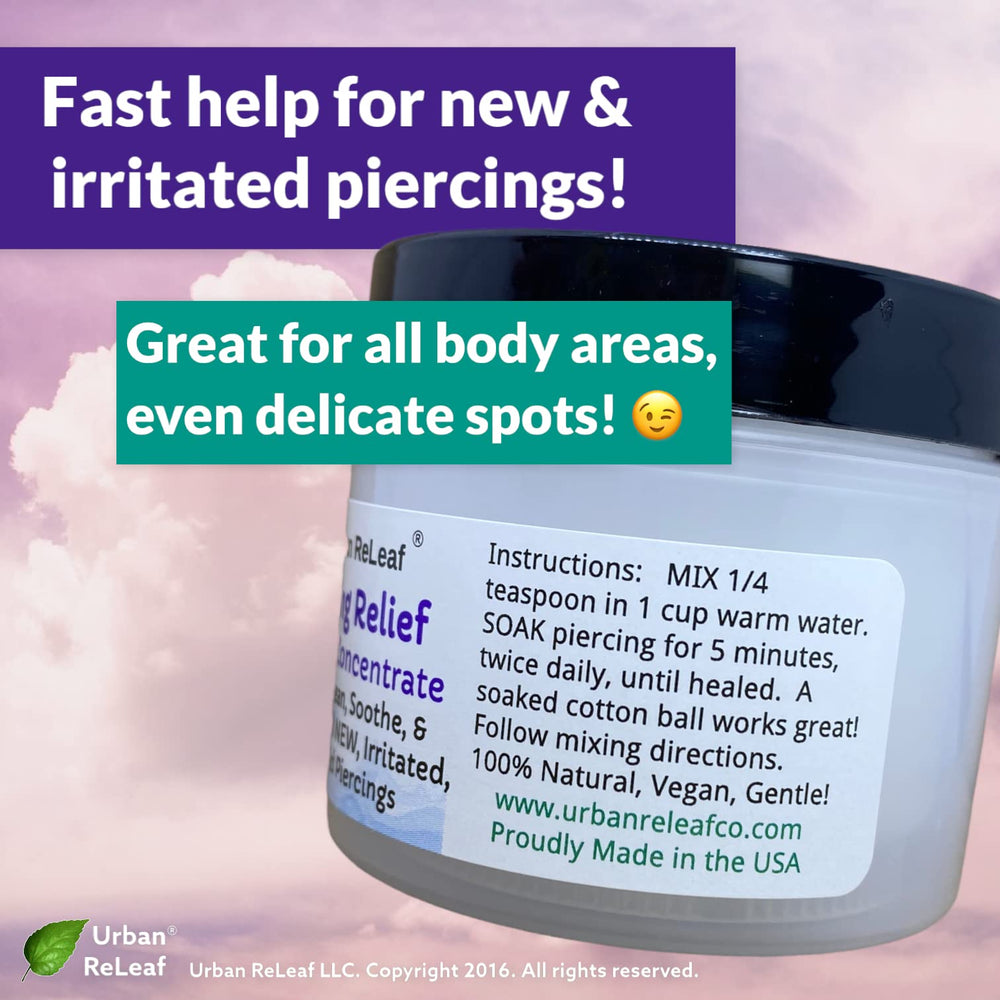 Urban ReLeaf Piercing Relief tea tree rosemary oils illustrate botanical skin care.