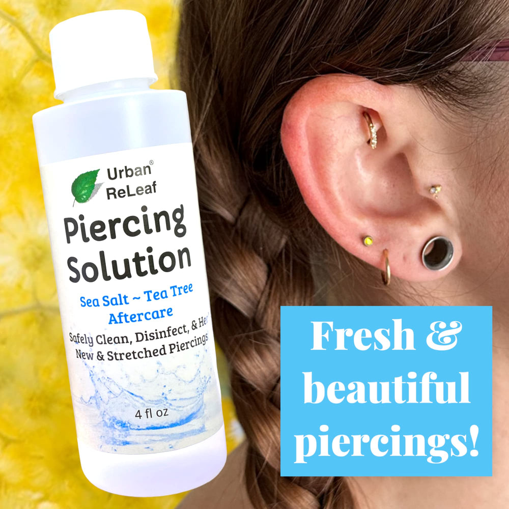 Urban ReLeaf sea salt soak on piercing area for soothing aftercare.