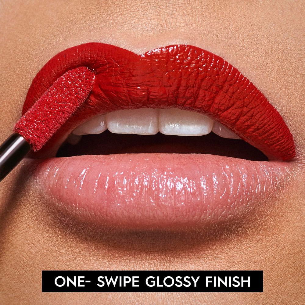 Urban Decay Vice Lip Bond Unbreakable red shade swatch emphasizes bold, transfer-resistant color.