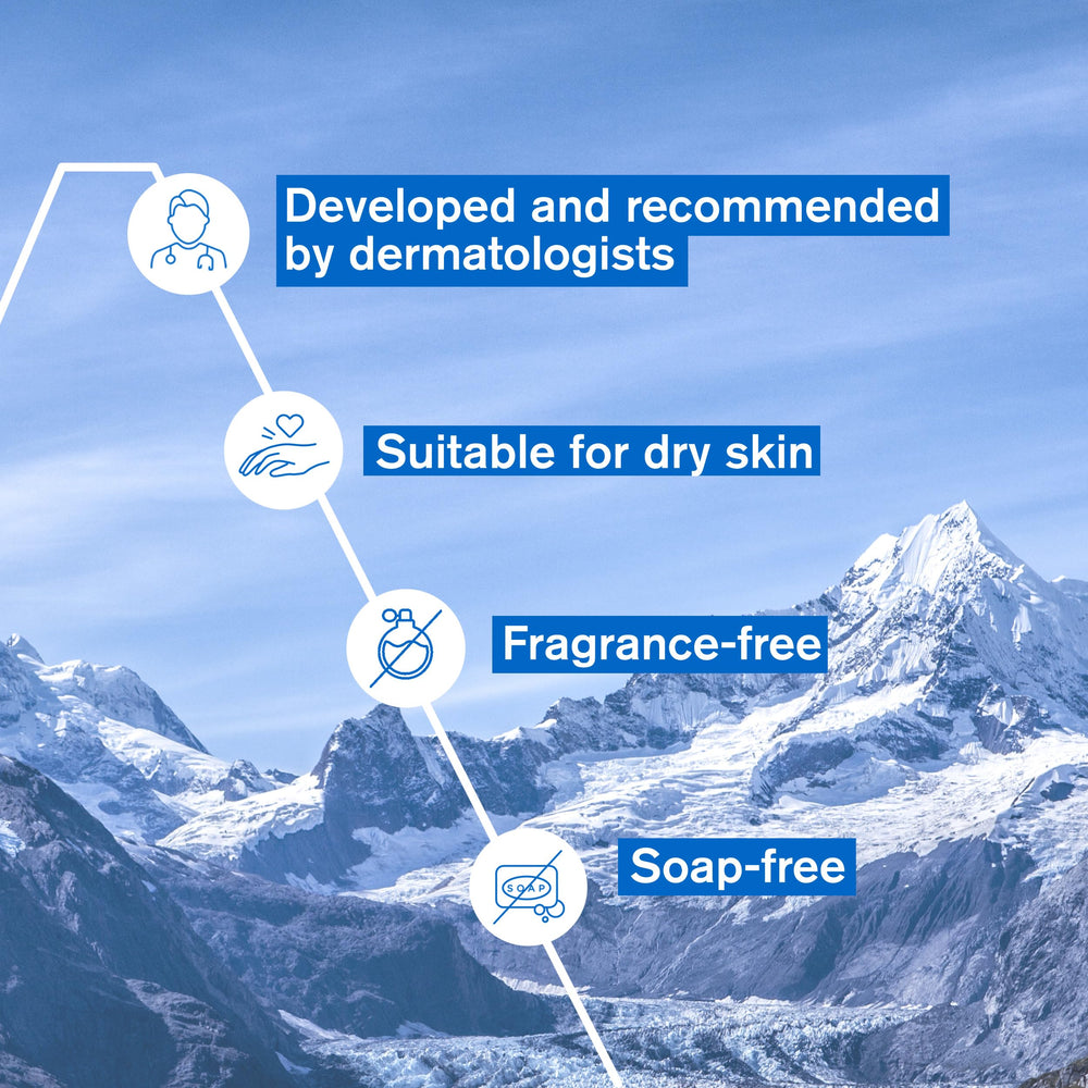 Uriage Gentle Cleansing Syndet application on skin shows soft, soothing foaming action.