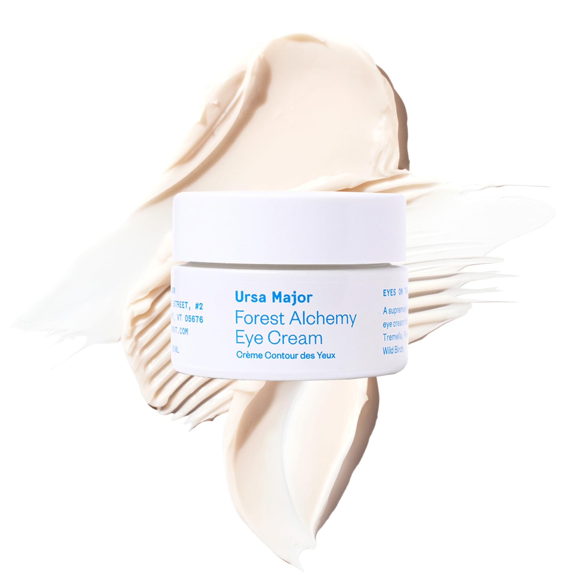 Ursa Major Forest Alchemy Eye Cream tube close-up shows creamy texture for delicate under-eye care