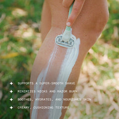 Ursa Major shave cream being applied by hands for quick prep.