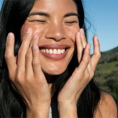 Ursa Major Vitamin C Serum dropper close-up emphasizes clean, citrusy aroma.