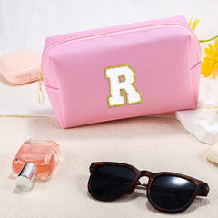 URSKYTOUS PU leather makeup bag close-up showing soft-touch finish.