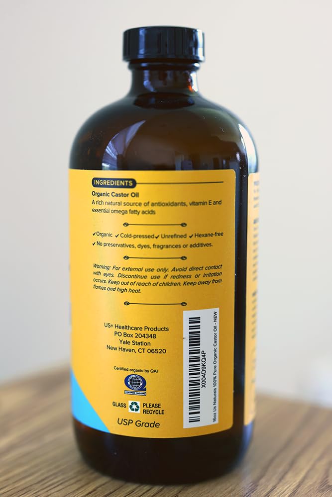 Us Naturals castor oil pour-cap setup for simple skincare routine.