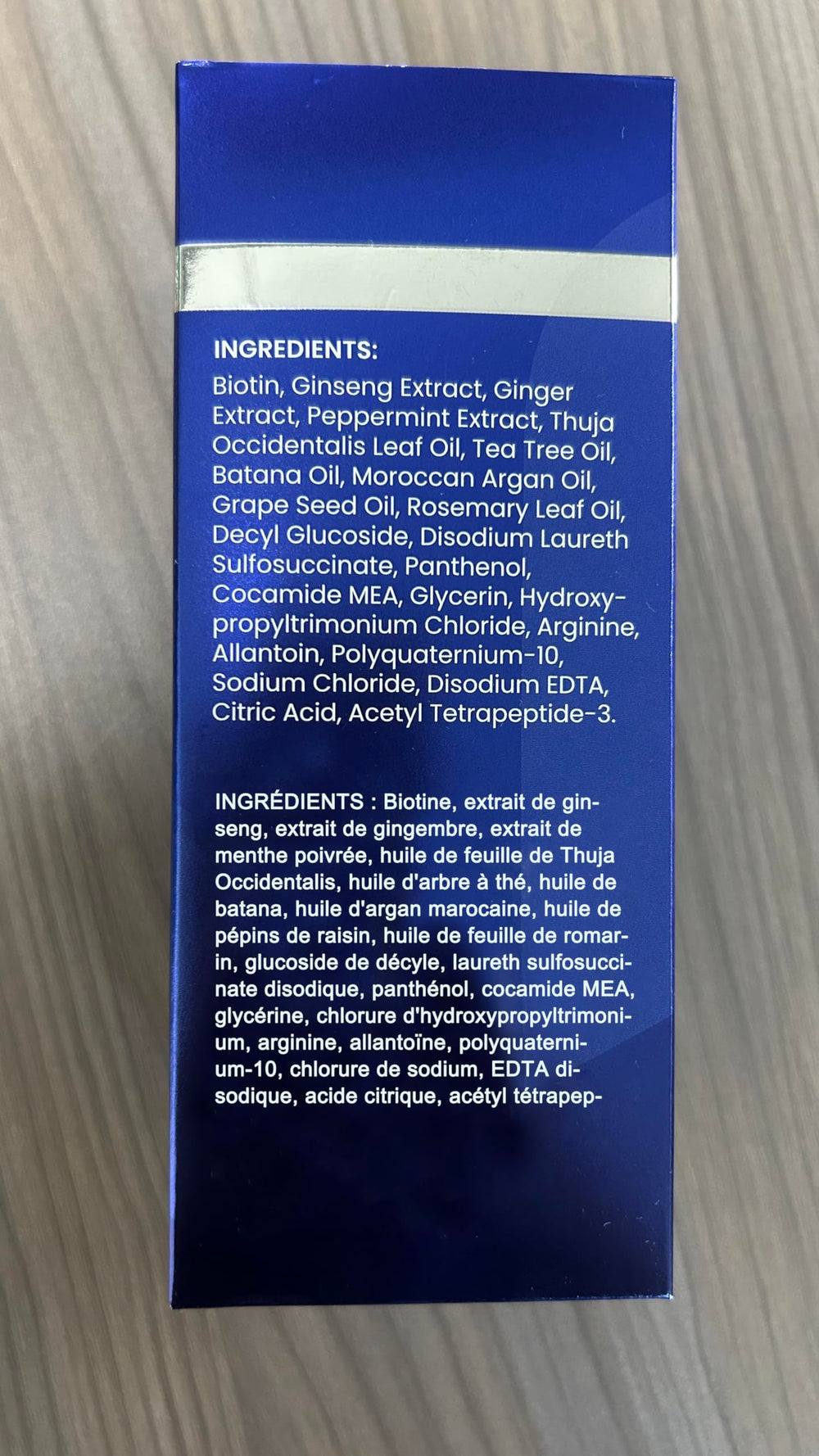 Uttse Biotion Shampoo dark blue bottle on counter premium hair care