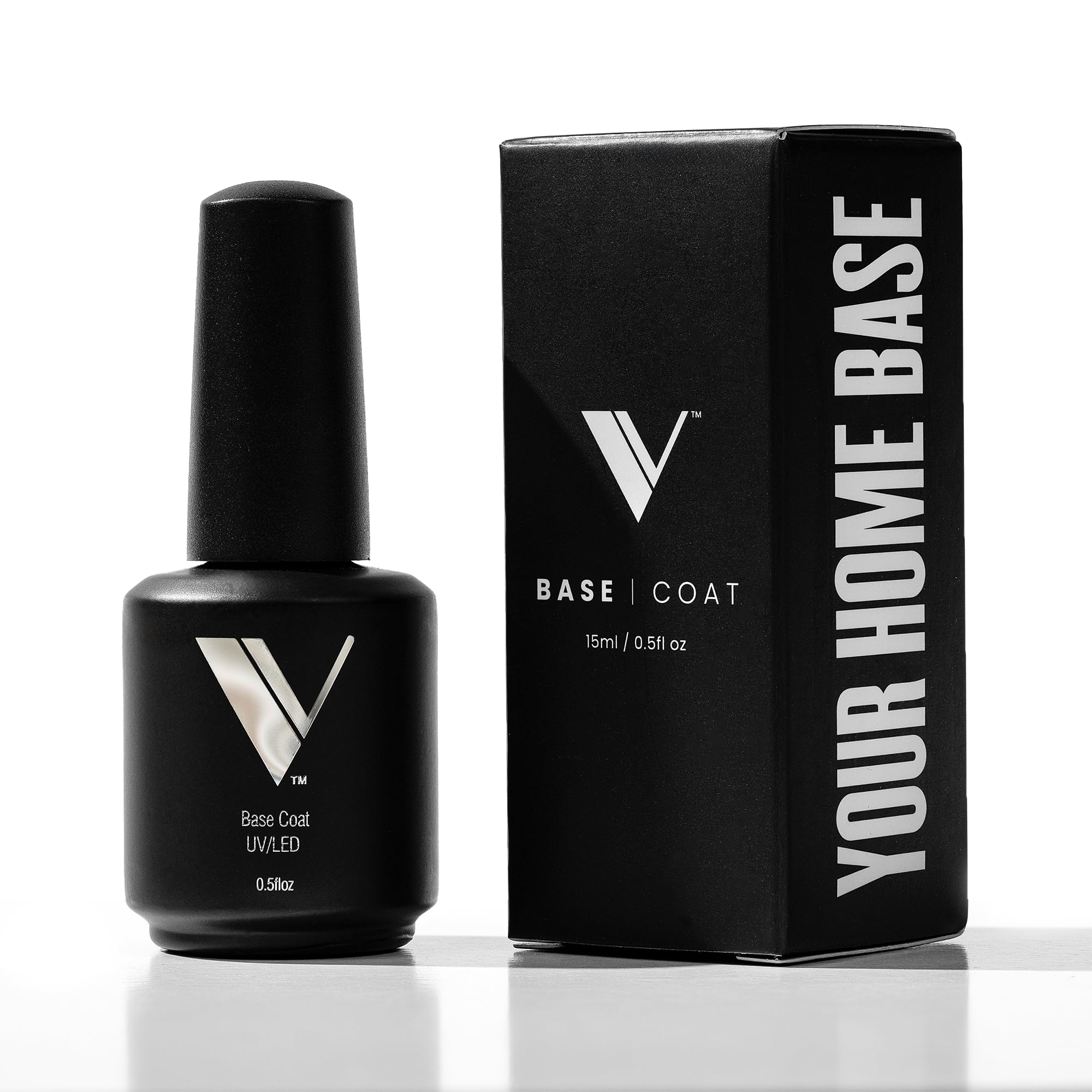 V Beauty Pure Gel Base Coat bottle applying a smooth base for a long-lasting manicure.