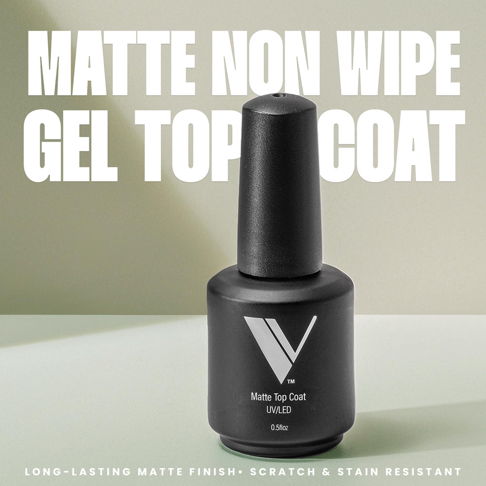 V Beauty Pure matte top coat application brush demonstrates smooth, chip-resistant manicure potential.