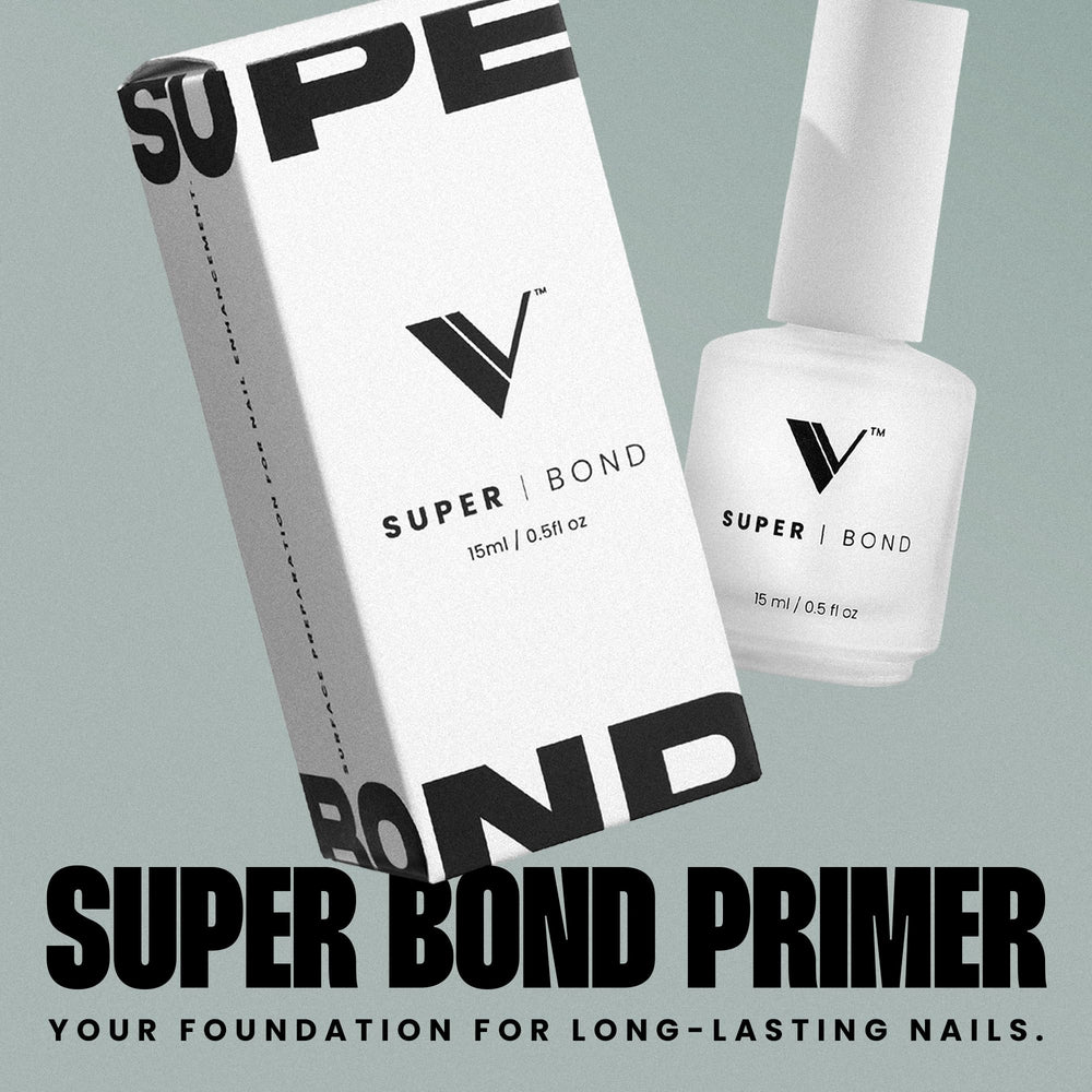 V Beauty Pure Super Bond Primer application brush demonstrates even coverage for reliable prep.