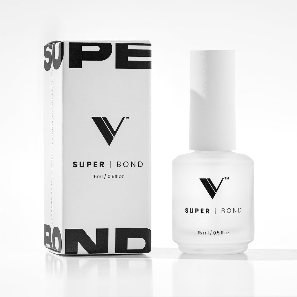V Beauty Pure Super Bond Primer close-up shows sticky adhesion for long-lasting nails.