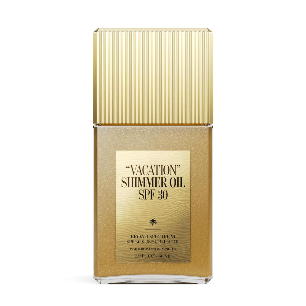 VACATION Shimmer Oil SPF 30 bottle side shows travel-friendly sun protection and glow