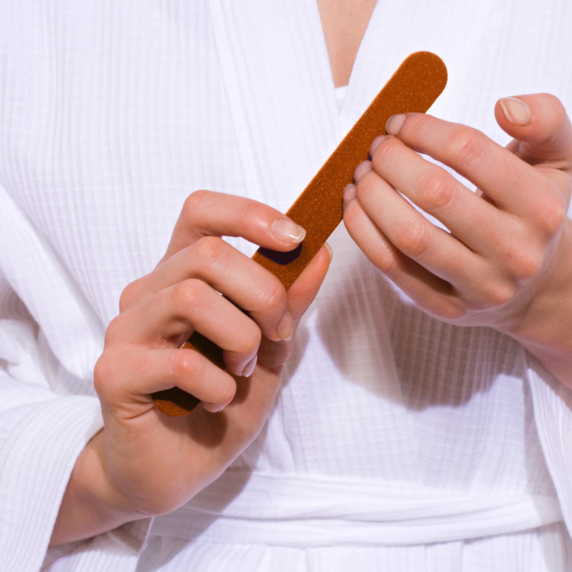 Vakly dual-sided nail file showing coarse and fine grit for shaping.