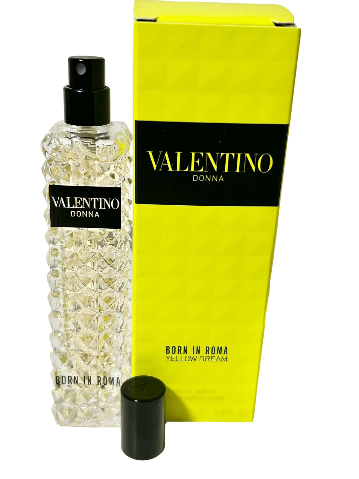 Valentino Donna Born In Roma Yellow Dream bottle front highlights citrus-inspired perfume for stylish daytime wear.