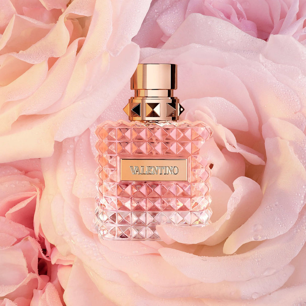 Valentino Donna fragrance notes close-up—hinting at a floral-woody fusion.