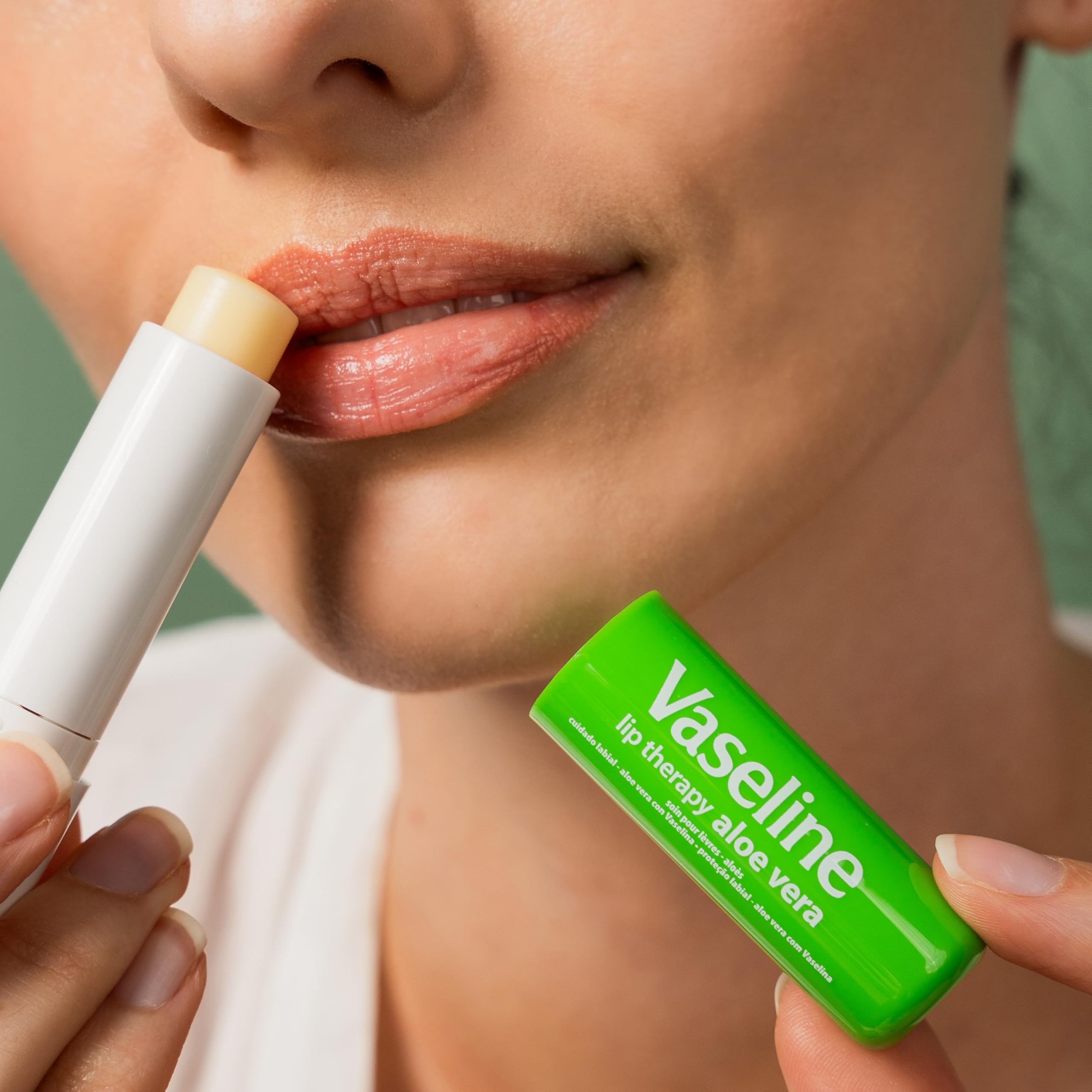 Vaseline Aloe Fresh Lip Therapy on lips demonstrates lightweight moisture.