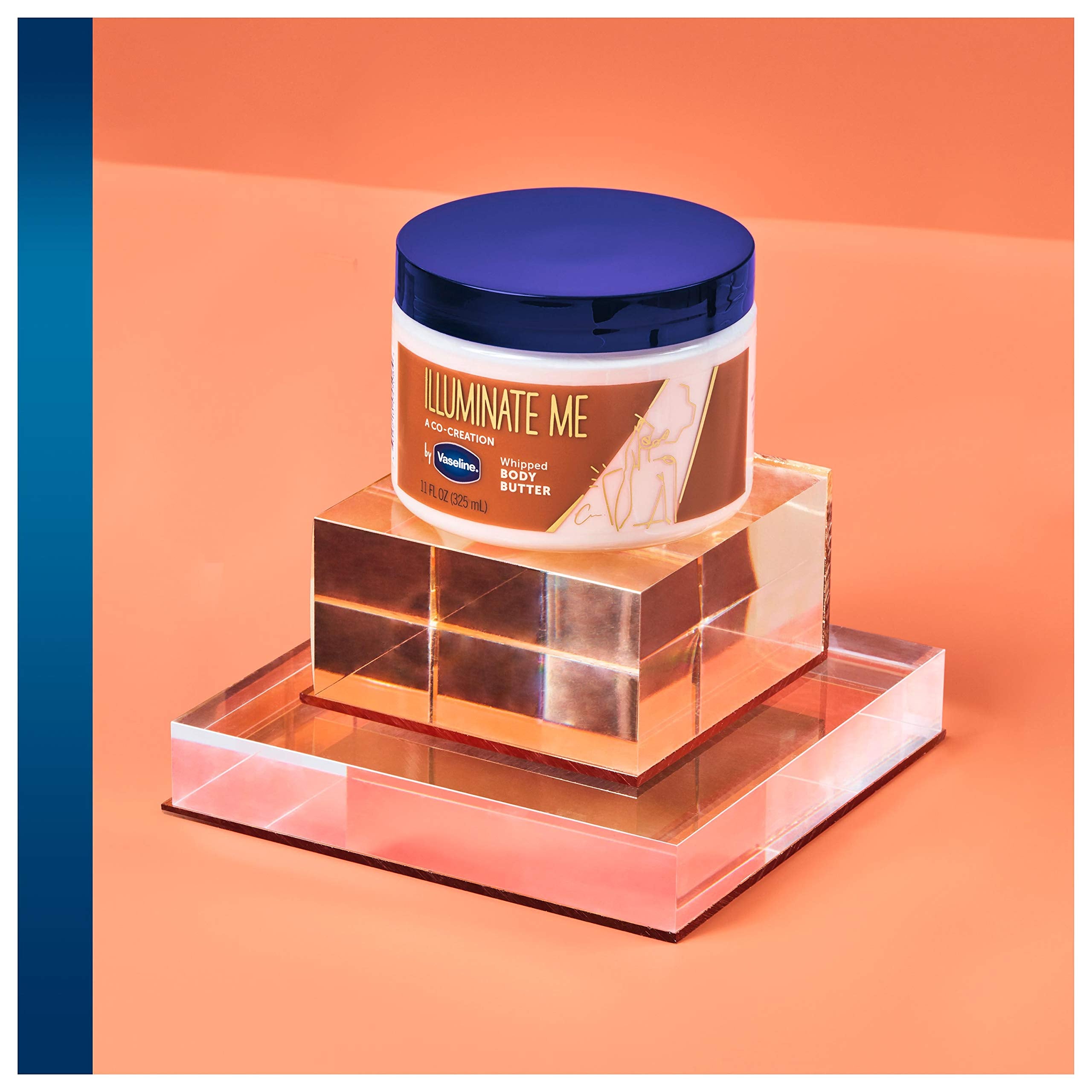 Vaseline jar open with product visible, shows easy scoopability and rich formula