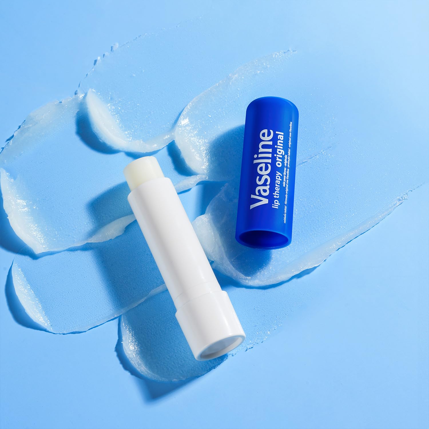 Vaseline Lip Therapy Original logo close-up highlighting trusted Vaseline brand.