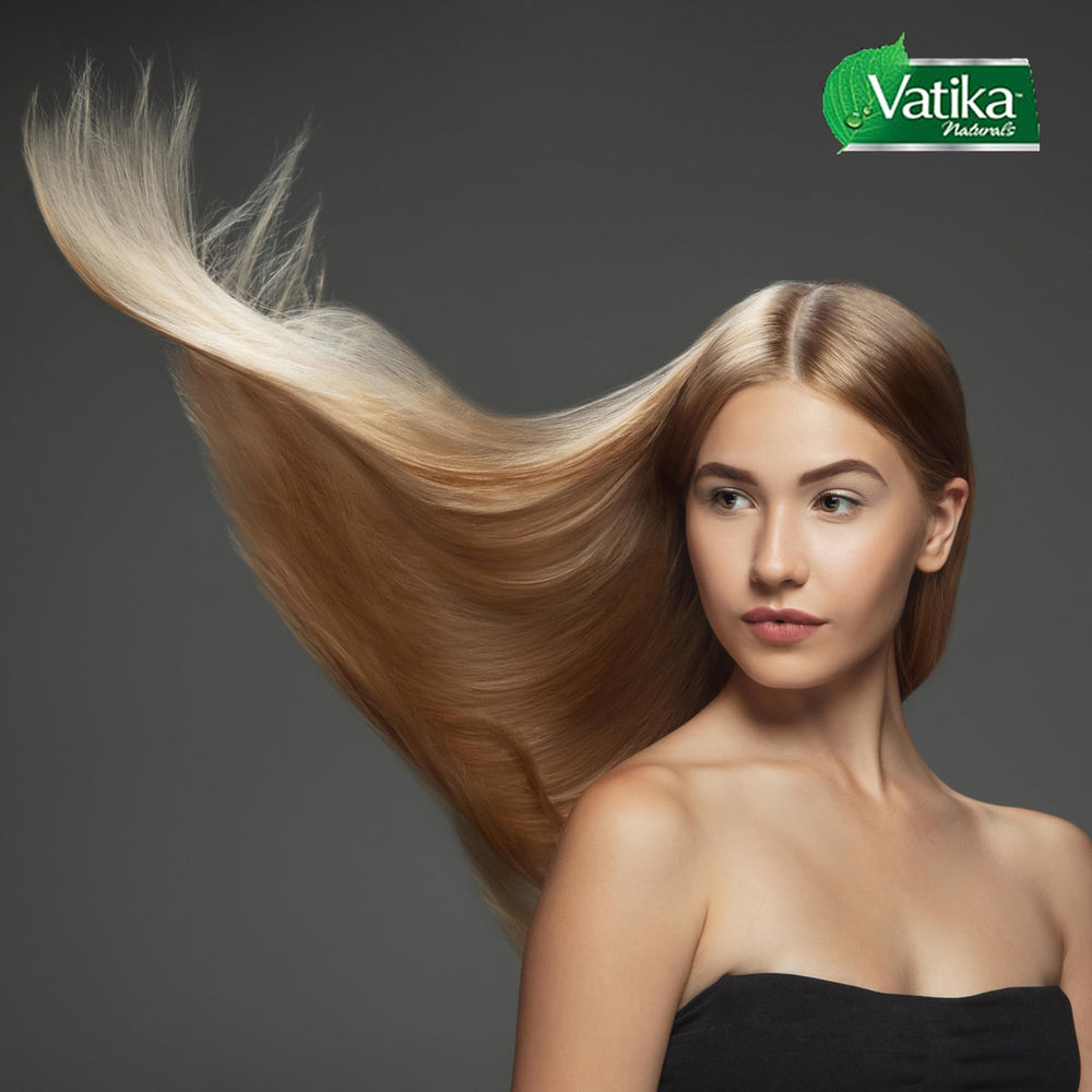 Vatika Naturals hot oil hair mask application on damp hair focusing ends