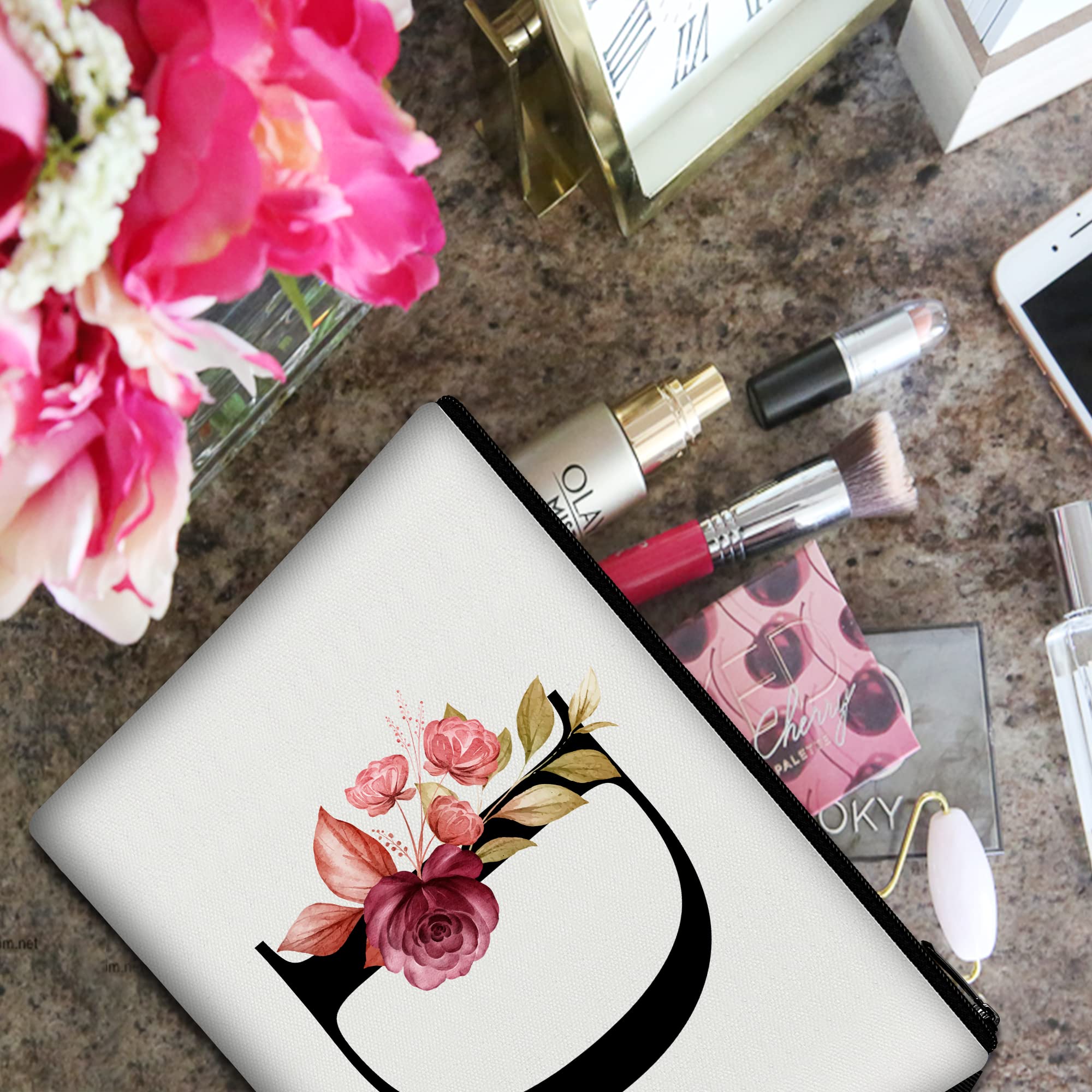 Vavabox makeup bag open with cosmetics inside for layout view
