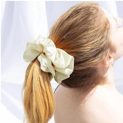 VEDO SHIPIN jumbo scrunchie worn in a ponytail for secure style